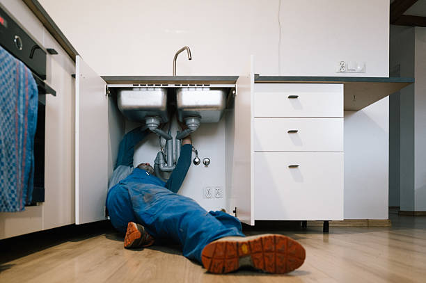 Professional Emergency Plumber technician working in West Liberty, OH